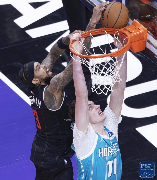 篮球｜NBA常规赛：猛龙胜黄蜂